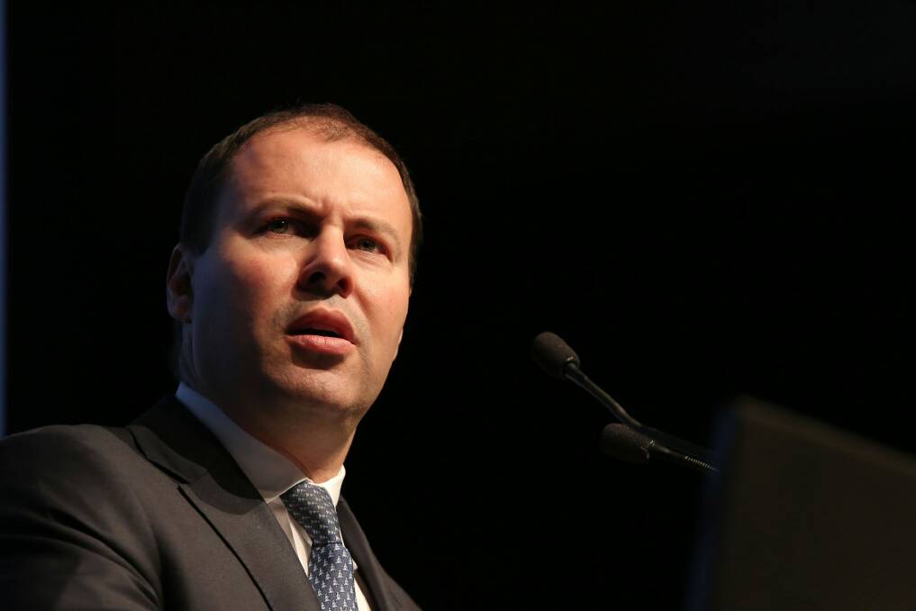 The review was effectively over before it began after Environment and Energy Minister Josh Frydenberg suggested the government was going to embrace an intensity scheme, and let it be linked to "carbon pricing". Photo: Philip Gostelow