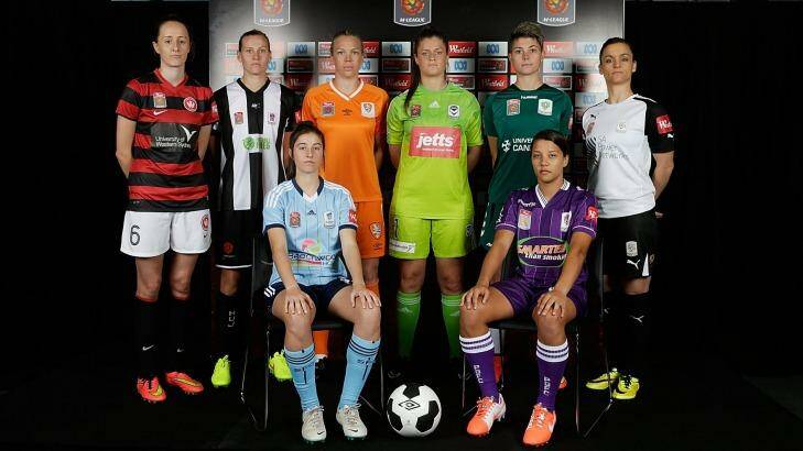 Rachael Soutar of Western Sydney, Emily van Egmond of Newcastle, Amy Harrison of Sydney, Kim Carroll of Brisbane, Brianna Davey of Melbourne, Michelle Heyman of Canberra United, Samantha Kerr of Perth and Melissa Barbieri of Adelaide pose during the W-League season launch on Monday. Photo: Getty Images