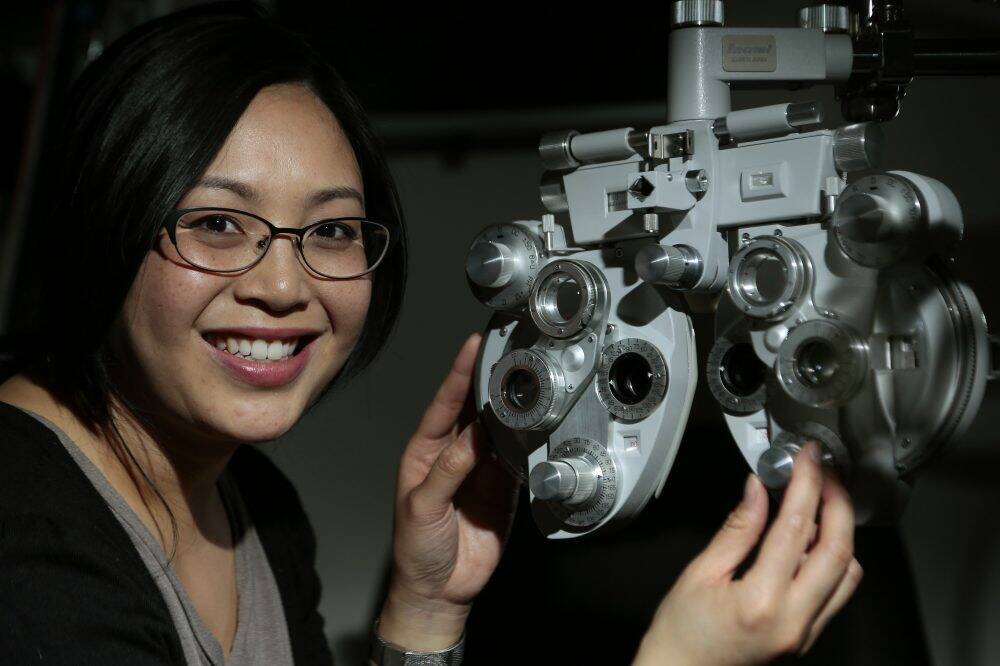 Canberra optometrist Hong Nguyen says all children should be tested.  Photo: Jeffrey Chan