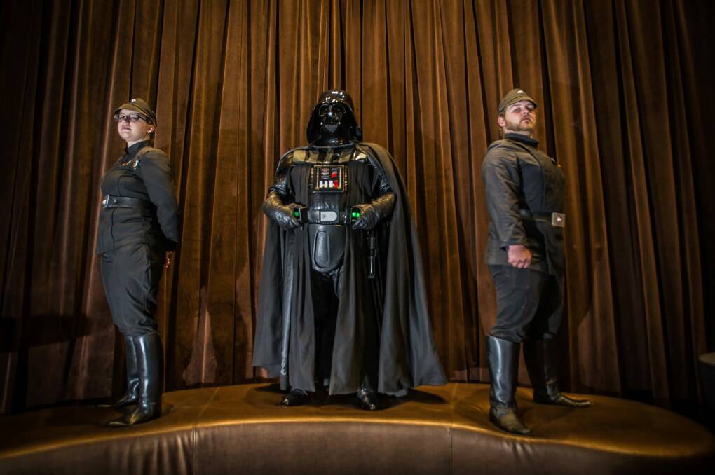 Canberra Star Wars fans and members of the 501st Legion prepping for the release of <i>Rogue One: A Star Wars Story</i> - Darth Vader (Jason Feldner), and imperial officers Tegan Smith and Matt Mulcahy.  Photo: Karleen Minney