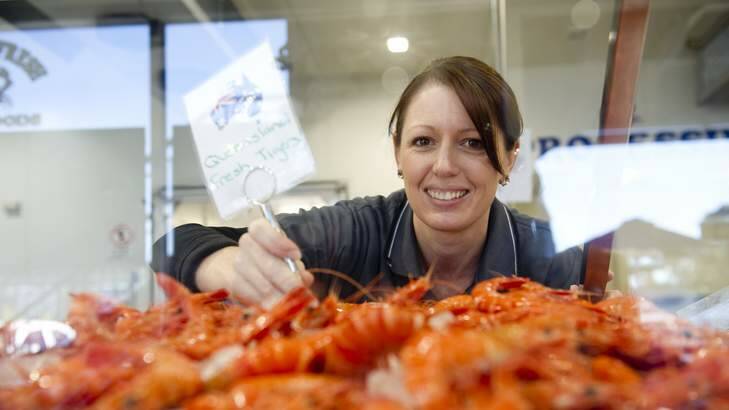 Owner of Ocean Fresh Seafoods Jenny Jones has been working overtime ahead of the Easter rush, filleting 850kgs of salmon and 400kgs of flathead. Photo: Jay Cronan
