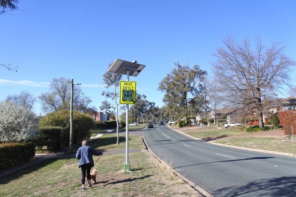 Some people in the Deakin street think the new signs are an eyesore and don't discourage motorists from speeding. Photo: Megan Doherty