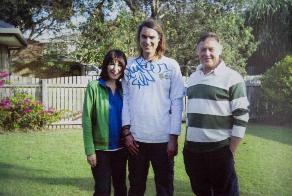 Murder victim Eden Waugh (centre) with his parents Elaine and David, who have appealed for people to come forward with information about his death. Photo: Supplied