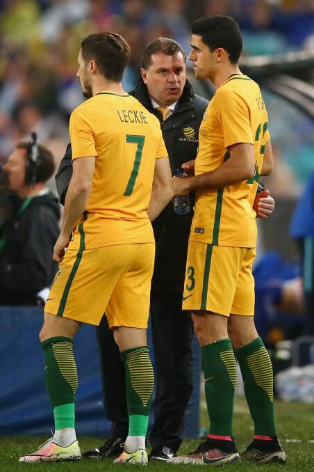 Ange Postecoglou has some words with young Socceroo Tom Rogic and Mathew Leckie. Photo: Getty Images