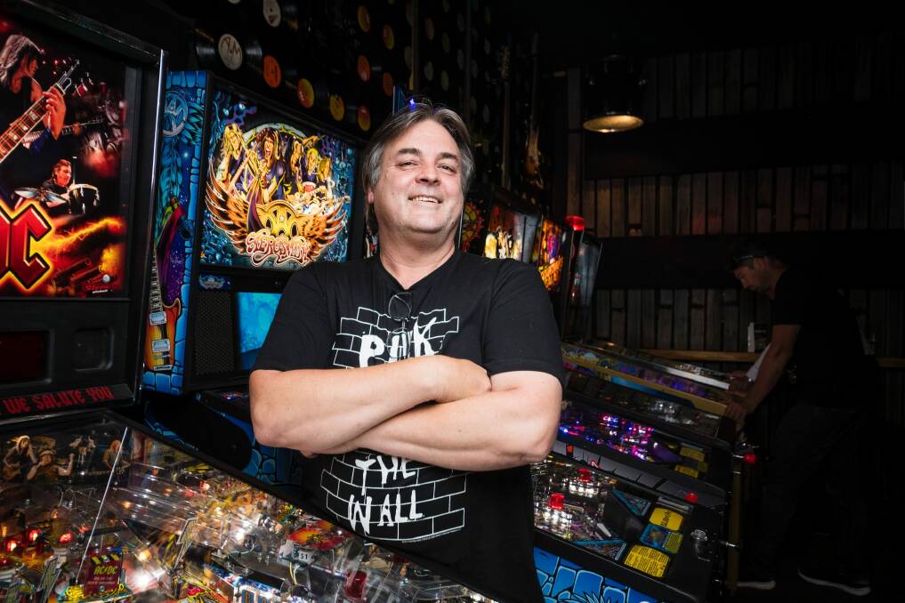 Steve Hyde taught himself to service pinball machines and now makes a living from it. Photo: Dion Georgopoulos