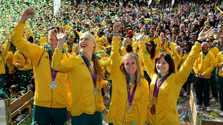 Canberra's Kim Crow (second from left) parties with fellow London Olympians Drew Ginn, Sally Pearson and Anna Meares, in Melbourne's Federation Square on August 22. Photo: Angela Wylie