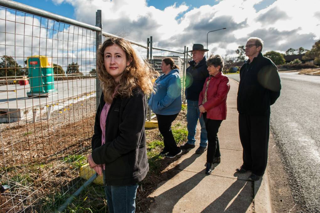 Giralang residents from left, Sarah Hulbert, Susan White, Noel White, Margaret Matthews and Paul Leighton remain frustrated by challenges to the approved plans for a 1500-square-metre supermarket. Photo: Elesa Kurtz