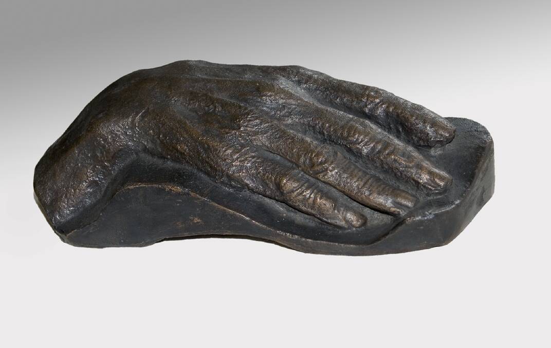 Bronze cast of Henry Lawson's right hand is on permanent display in Treasures Gallery at the National Library of Australia. Photo: Supplied