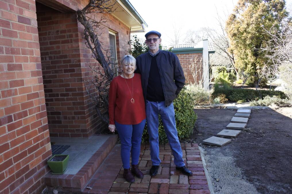 June and Jeff Dreese outside their Narrabundah home. The pillars were found in the area which is now newly bricked. Photo: Megan Doherty