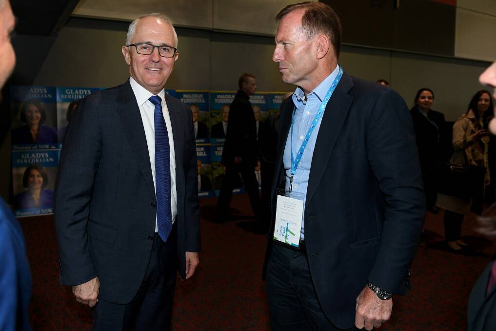 Cold War: Prime Minister Malcom Turnbull and his predecessor Tony Abbott. Photo: Dan Himbrechts