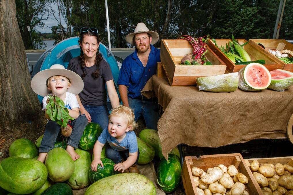 Erin Cooper and Dan Mundy from Tobellie Hill Produce in Kindervale with their children Toby, 3, and Ellie, 2.  Photo: Sitthixay Ditthavong