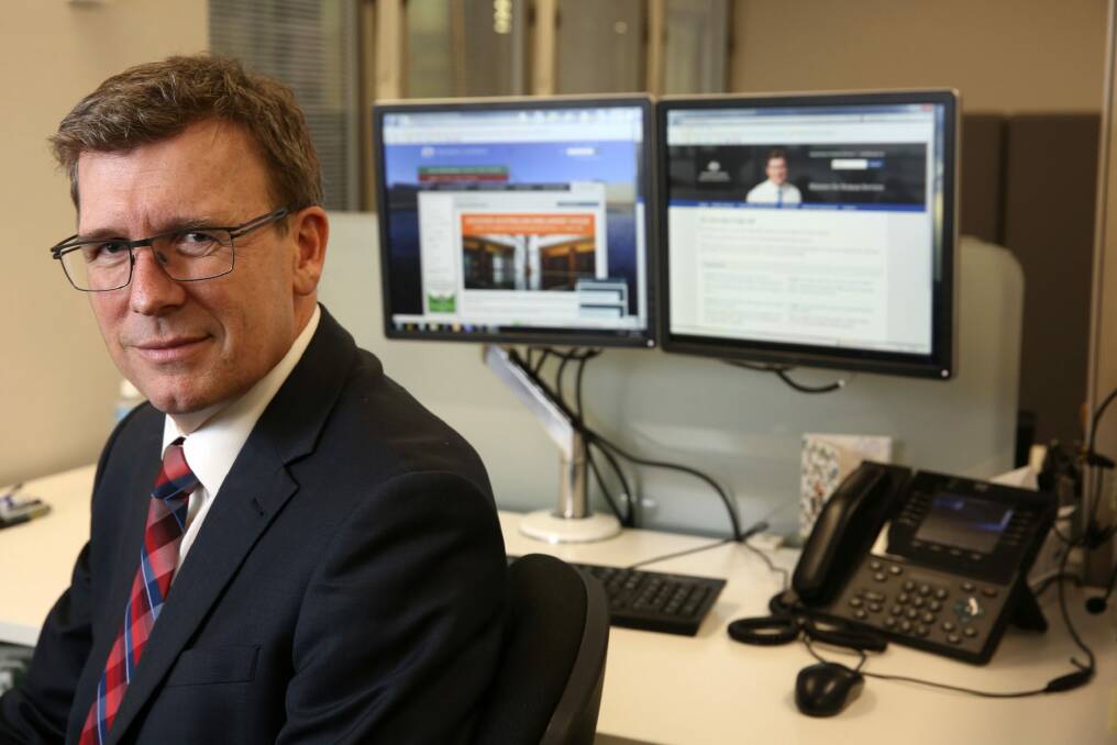 Human Services Minister Alan Tudge has defended the "robo-debt" system. Photo: Kirk Gilmour