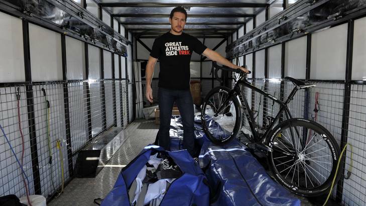 Simon Thompson of Trek, in the trailer from which $183,000 worth of bikes were stolen over the weekend. Photo: Jay Cronan
