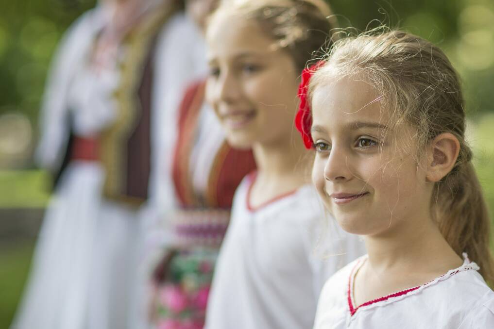 Lilly Nedeska, 6, and members of the Macedonian dance group in Queanbeyan  Photo: Matt Bedford