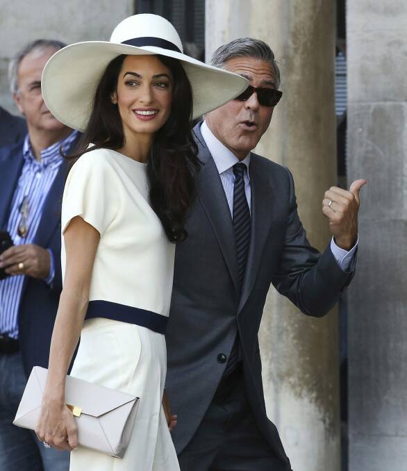 Fascinating couple: George Clooney and Amal Alamuddin.  Photo: Getty Images