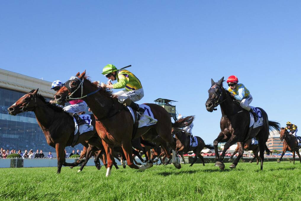 Damian Lane, riding Flamberge, defeats Fell Swoop in the Oakleigh Plate. Photo: Getty Images