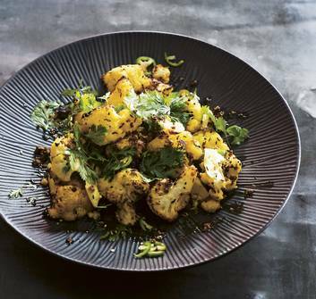 Cauliflower roasted with panch phoran and fresh turmeric. Photo: Supplied