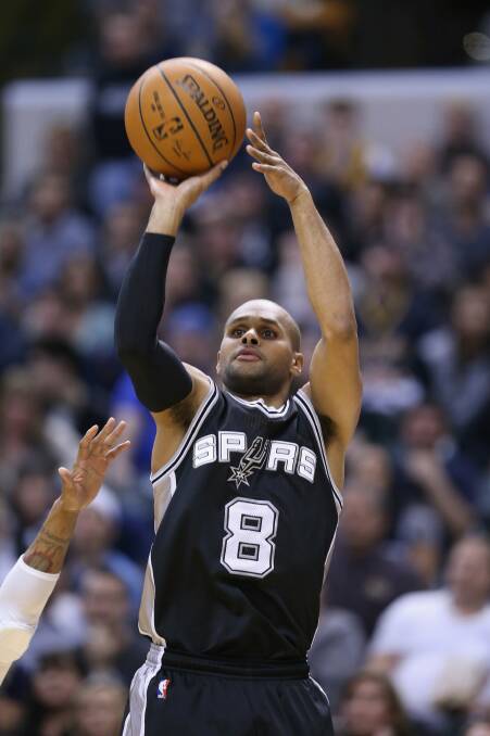 Patty Mills traded Christmas lunch for a sold-out NBA clash on Christmas Day. Photo: Getty Images