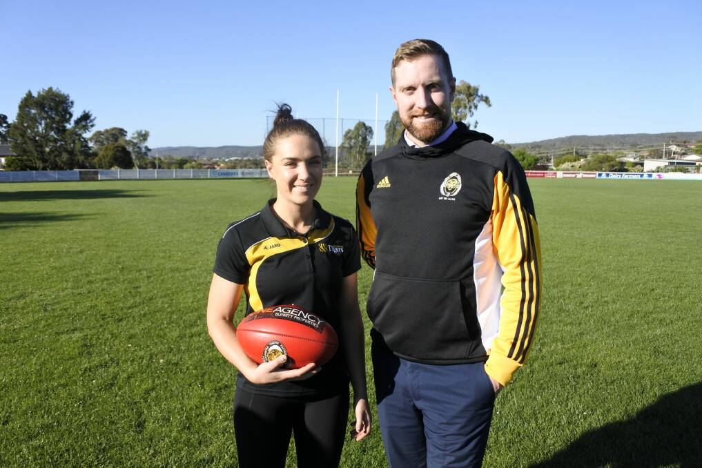 The Queanbeyan Tigers' Hannah Dunn and Ryan Quade will be visiting the Solomon Islands with a group from their football club. Photo: Elliot Williams