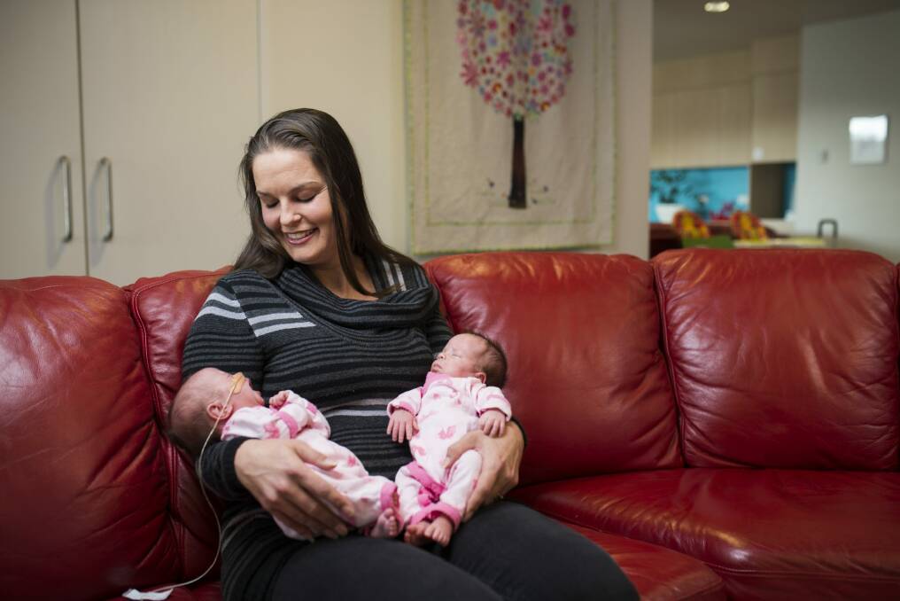 Eleanor Brown with her twins, (L-R) Imogen and Annalise at Ronald McDonald House at the Canberra Hospital. 
 Photo: Rohan Thomson