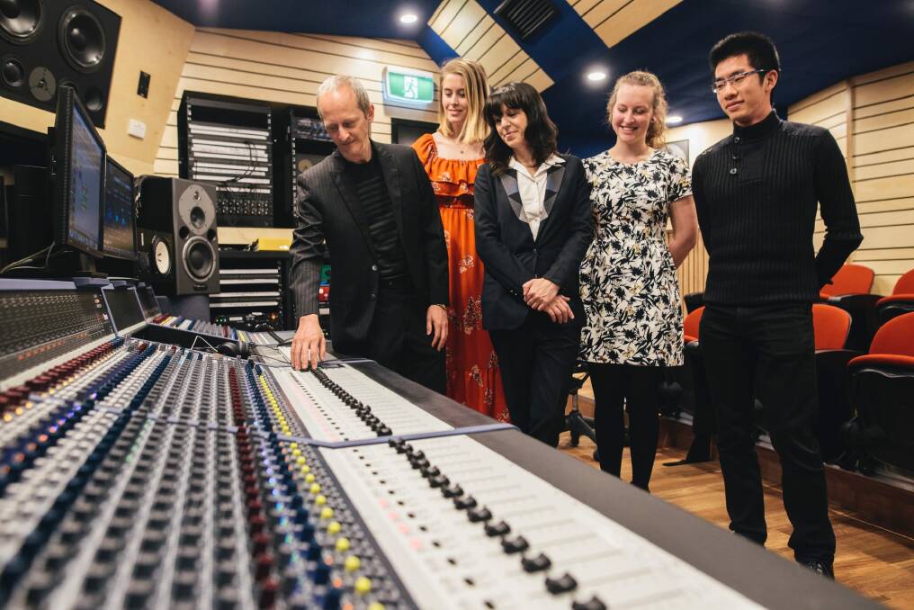 ANU School of music's Ken Lampl and Samantha Bennett with students Amy Jenkins (second from left) Jacqui Douglas (second from right) and Aaron Chew (right) at the opening of the new recording studio at the school. Photo: Rohan Thomson