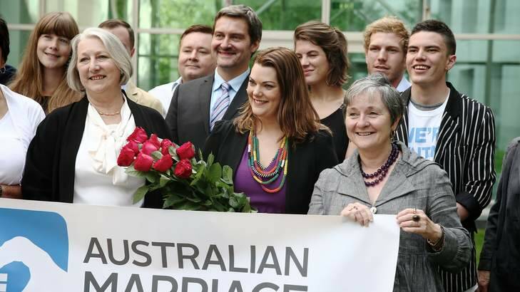 Senators Sue Boyce (Liberal), Sarah Hanson-Young (Greens) and Claire Moore (Labor) launching a campaign on marriage equality in Canberra. Photo: Alex Ellinghausen