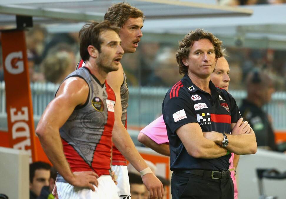 Sidelined: Jobe Watson and coach James Hird during season 2015. Photo: Getty Images