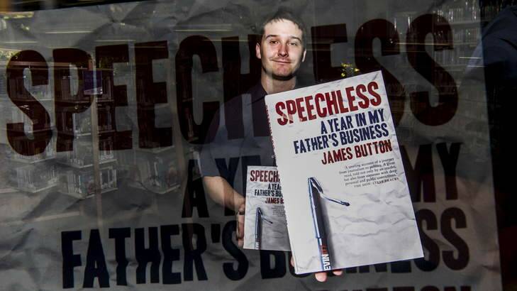 Dickson Library's Adrian Constance with the most borrowed book of 2012, <i>Speechless: a year in my father’s business </i> by James Button. Photo: Rohan Thomson