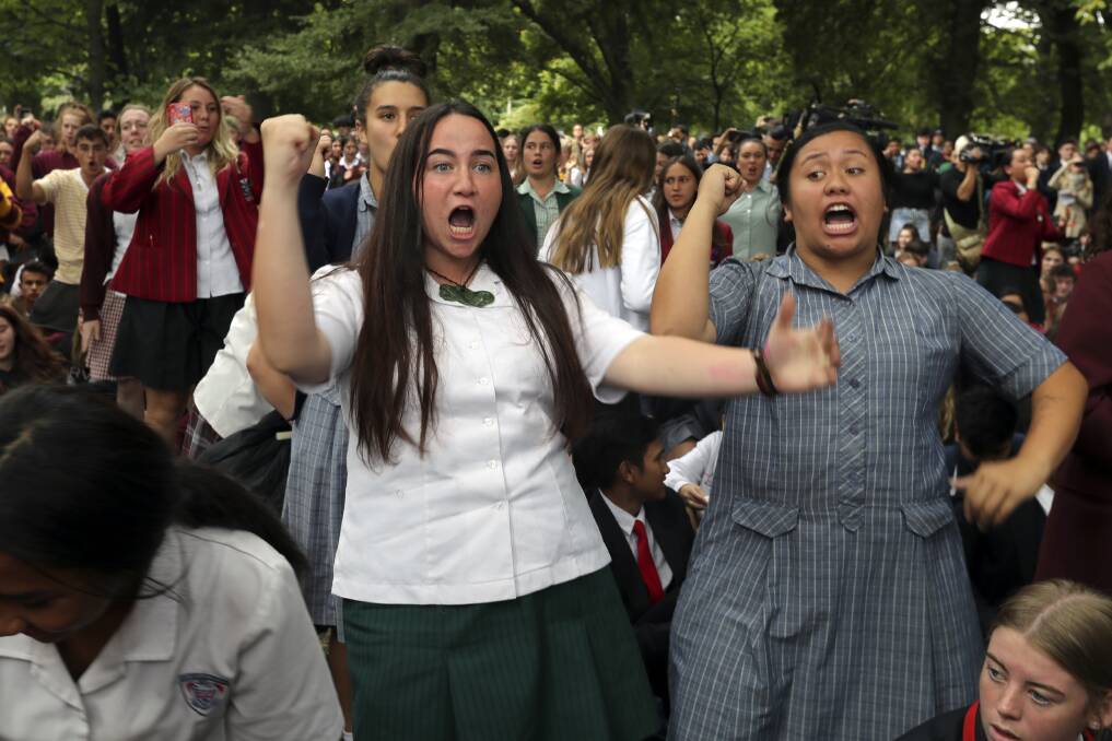 New Zealand students perform the haka during a vigil to commemorate victims of the Christchurch shootings. Photo: AP