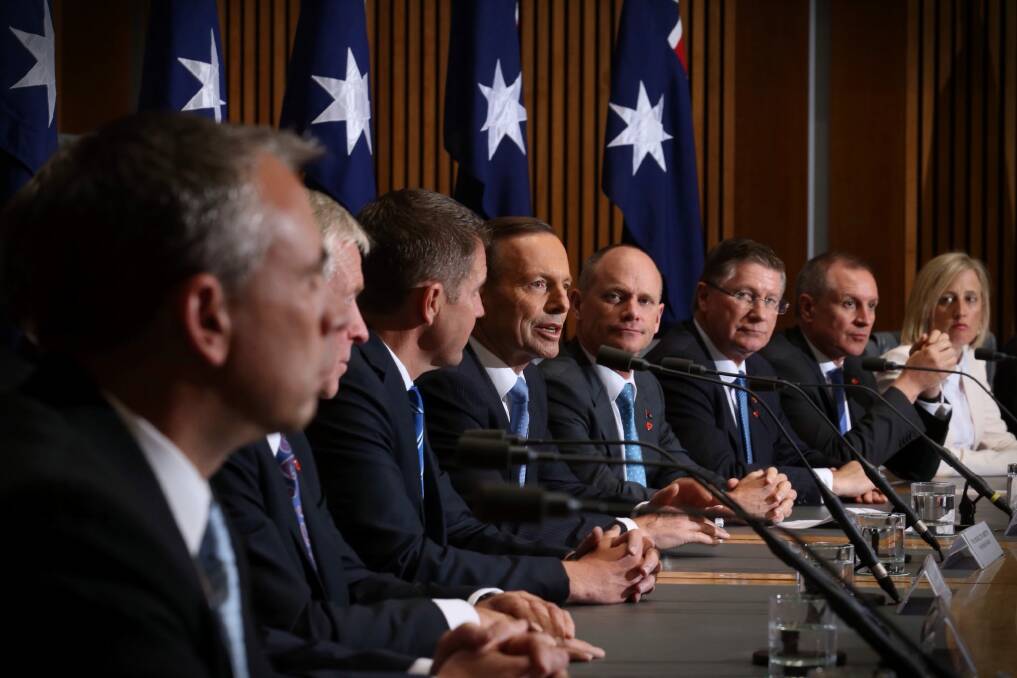 Prime Minister Tony Abbott, centre, with state premiers and territory chief ministers after COAG in Parliament House in Canberra. Photo: Andrew Meares