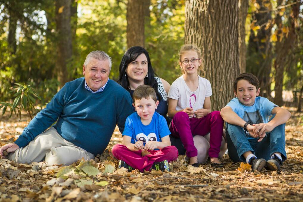 ACT Barnardos Mother of the Year winner Chauntell McNamara with her family, (from left) husband Andrew, Chauntell, Cooper, 6, Annabella, 8, and Brodie, 13. Photo: Jamila Toderas