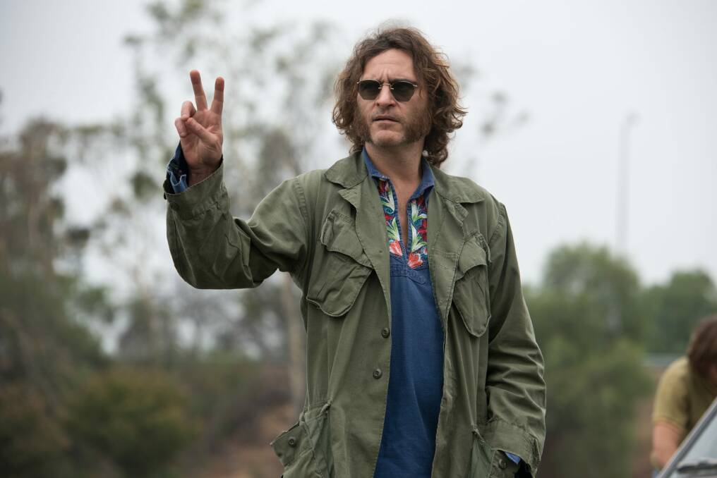 Detective Larry "Doc" Sportello (Joaquin Phoenix) investigates the disappearance of a former girlfriend in Inherent Vice. Photo: Wilson Webb