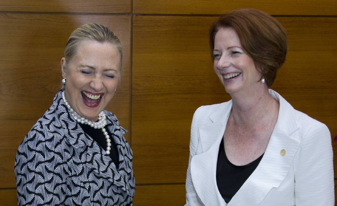 Hillary Clinton shared a laugh in 2012. Photo: Victor R. Caivano