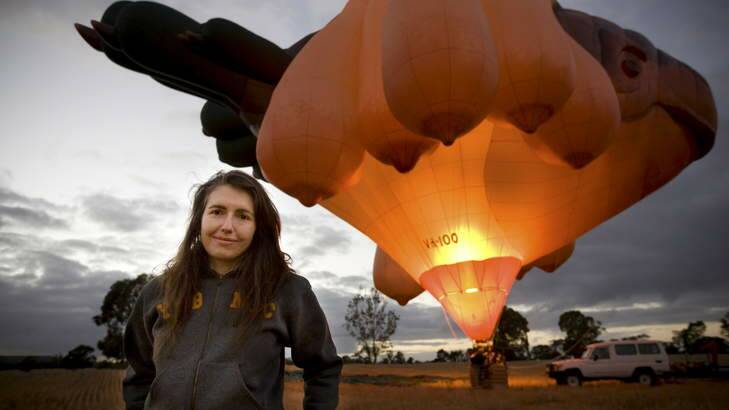 Internationally renowned artist and former Canberran Patricia Piccinini in front of the <em>Skywhale</em>.