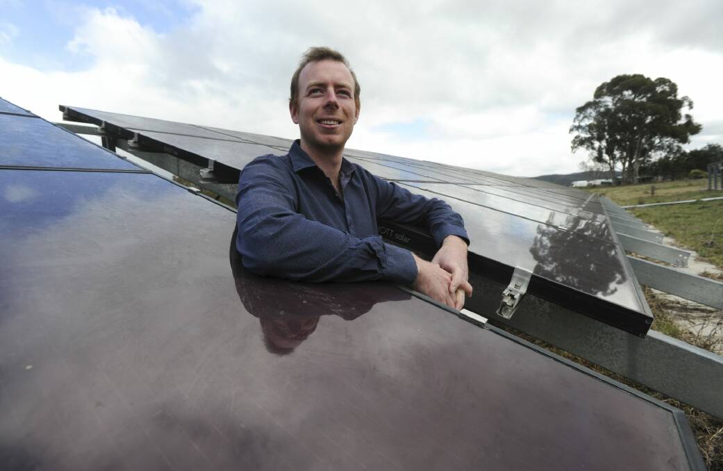 Lawrence McIntosh, of SolarShare Canberra, at the solar array in the grounds of Canberra Youth Haven, off Kambah Pool Road, Kambah. The company is building a new solar farm at Majura. Photo: Graham Tidy