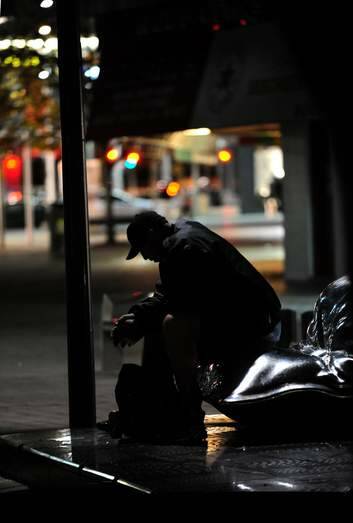 A homeless man in Civic ...  concerns are growing about housing affordability. Photo: Karleen Minney