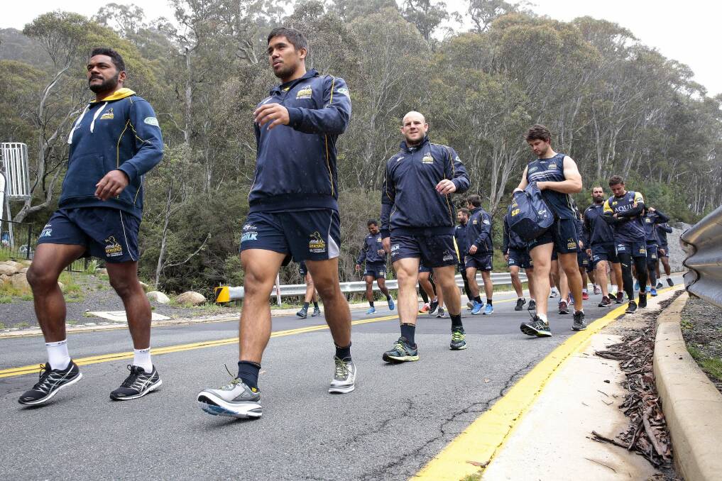 Brumbies coach Stephen Larkham dropped the squad on the side of the road and made them walk back to the team's Thredbo base. Photo: Jeffrey Chan
