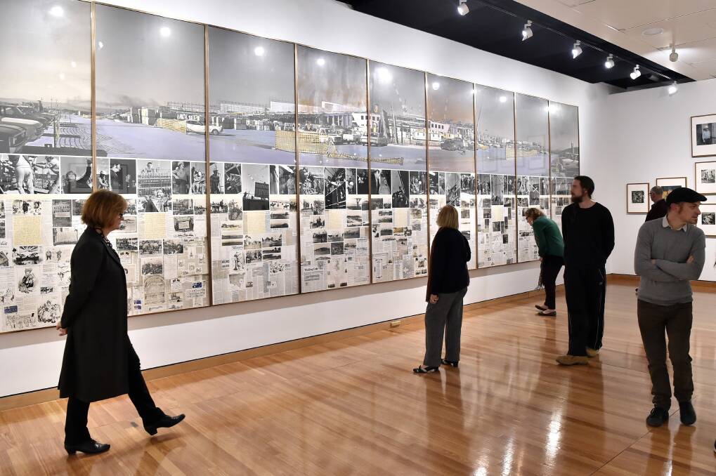 Visitors at CMAG, with photographic work by Grace Cochrane commissioned as part of the documentation process of building Parliament House. Photo: DPS/Auspic, Penny Bradfield