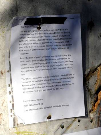 A note from three friends was left at the scene. Photo: Graham Tidy