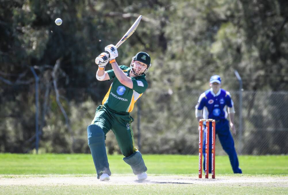 Weston Creek Molongolo's John Rogers hits out. Photo: Sitthixay Ditthavong