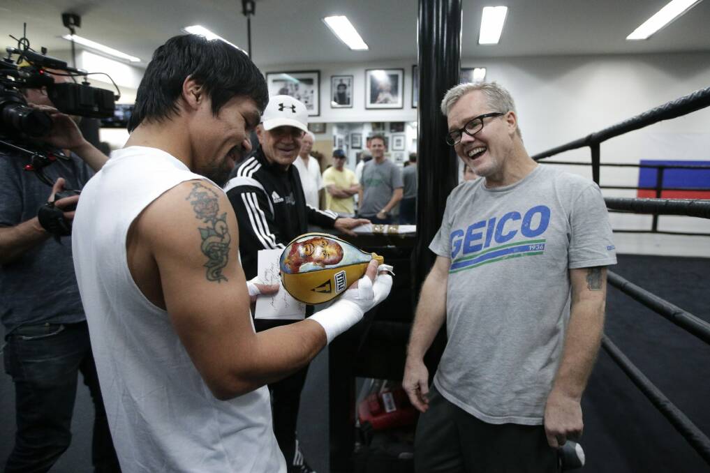 Special bond:  Manny Pacquiao and his trainer Freddie Roach. Photo: AP