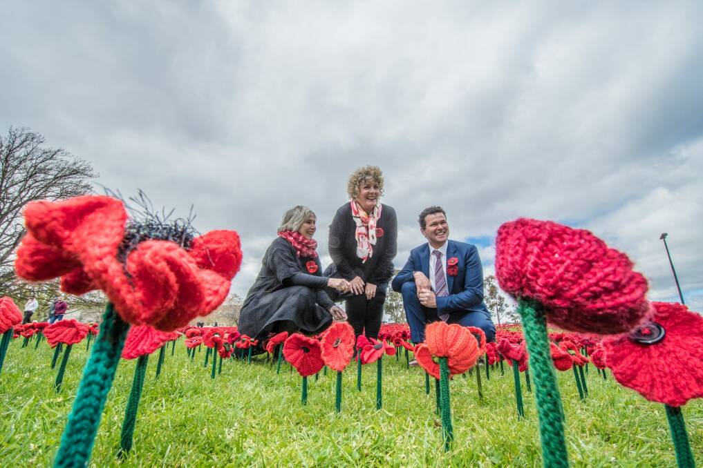 Co-founders of the 5000 Poppies project Margaret Knight and Lynn Berry, with architect Philip Johnson, at the Australian War Memorial on Friday.    Photo: Karleen Minney