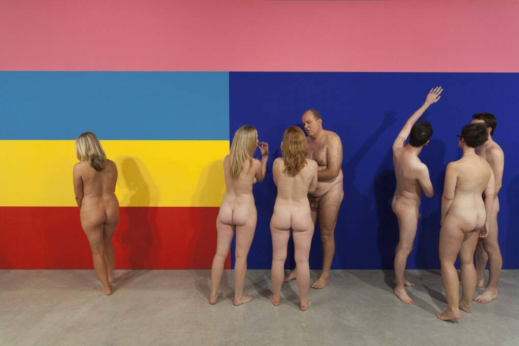 Artist Stuart Ringholt leads a naked tour through the Museum of Contemporary Art in Sydney.  Photo: Christo Crocker