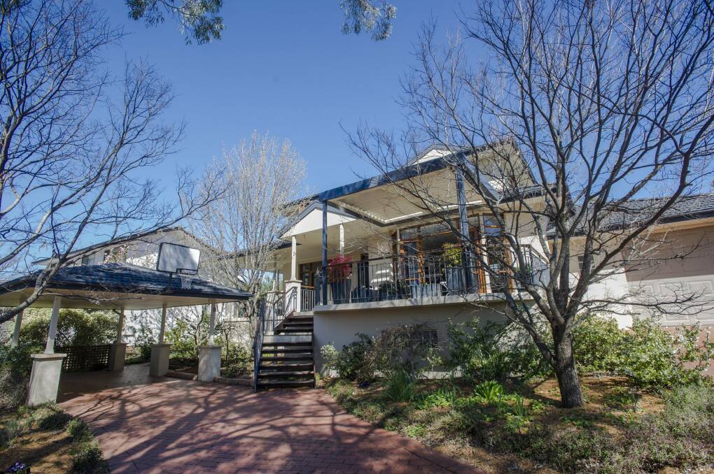 This home in Curtin was auctioned on Saturday morning. Photo: Jamila Toderas