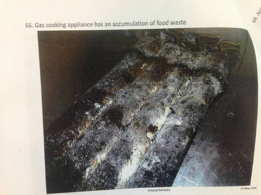 Gas cooking appliance with an accumulation of food waste. Photo: Supplied