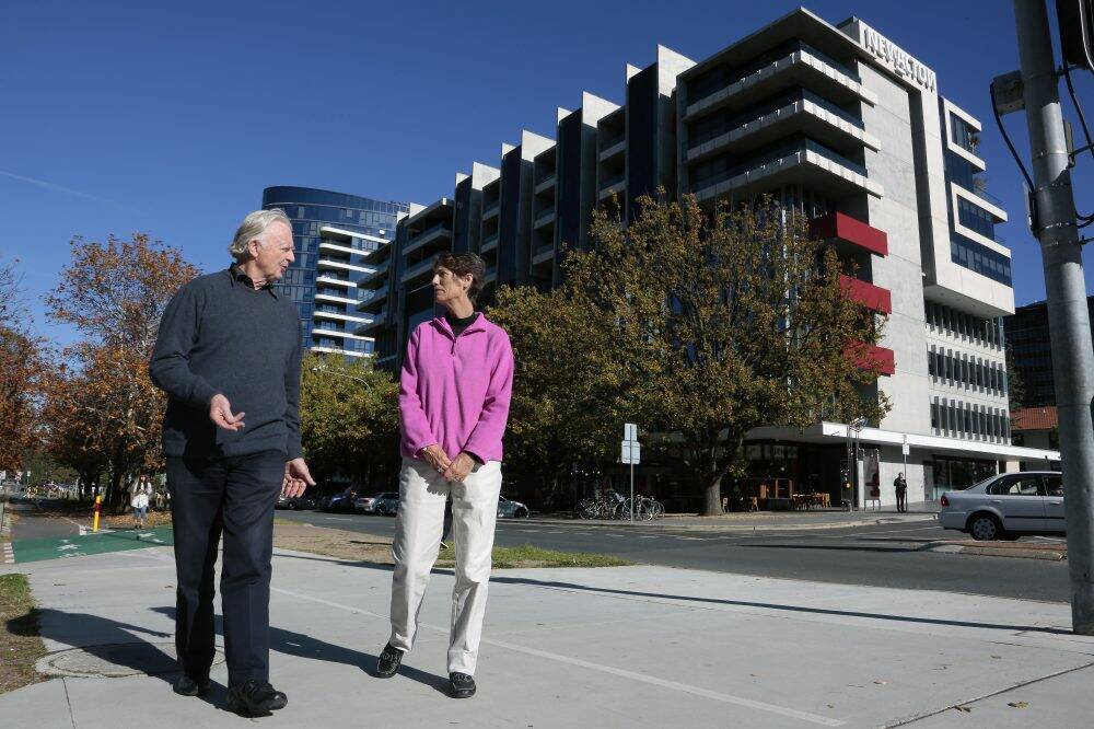 New Acton South resident Roger Smith and New Acton East resident Maureen Hay are after a more reasonable approach by short-term guests that recognises  the development is a residential area. Photo: Jeffrey Chan