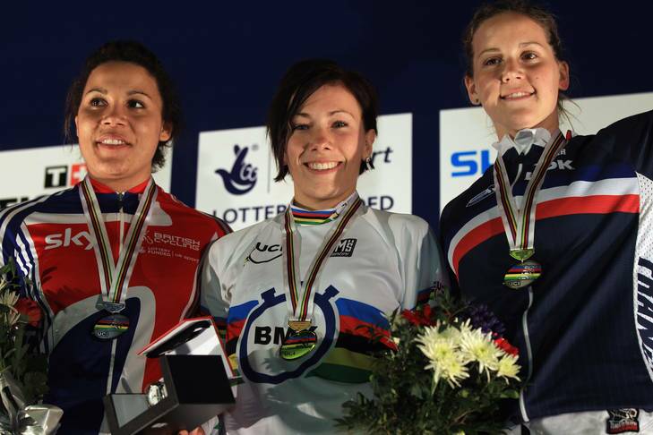 Shanaze Reade (2nd) of Great Britain, Caroline Buchanan (1st) of Australia and Eva Ailloud (3rd) of France stand on the podium after the final of the women's time trial at the BMX world championships. Photo: Bryn Lennon