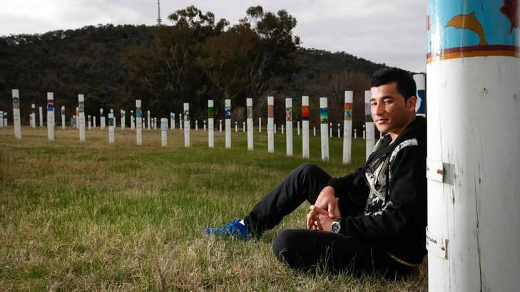 Ejaz Syed, 24 from Quetta, Pakistan, came to Australia by boat in 2011, he stands at the SIEV X (Suspected Illegal Entry Vessel X) memorial at Weston Park, reflecting on the 353 lives that were lost when a refugee vessel sunk in 2001. Photo: Katherine Griffiths
