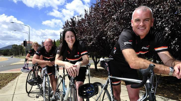Cyclists from Price Waterhouse Cooper (front - back) Steve Baker, Emma Stonham, Matthew Penrose and Maressa Carey taking part in the Big Canberra Bike Ride. Photo: Jay Cronan