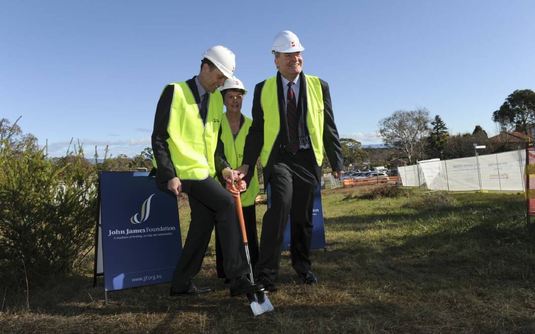 Sod-turning ceremony at the John James Village site in Garran. From left, ACT Health Minister Simon Corbell, Chris McMillan, General Manager of the Leukaemia Foundation of NSW/ACT and Prof. Paul Smith, Chairman of the John James Foundation.

 Photo: Graham Tidy